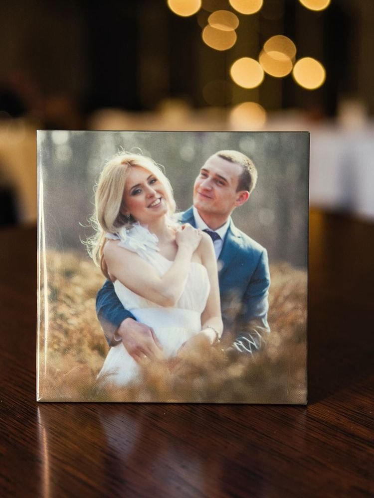 Custom wedding photo magnet of a couple embracing in a golden field